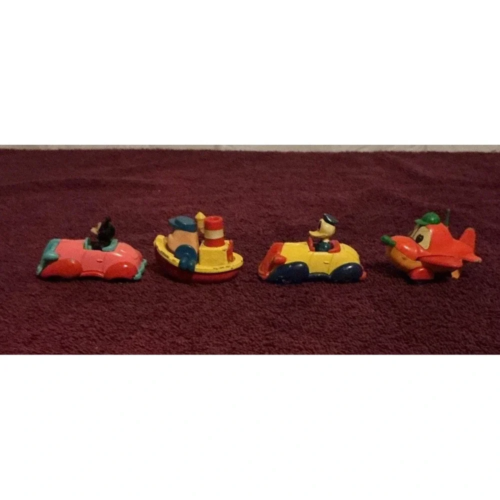 Lot Of 4 1970s Walt Disney Production Tomica Die Cast Cars, Boat & Airplane